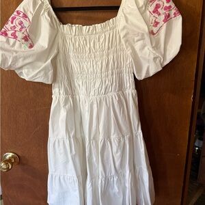 Elegant White Dress with Pink Accents